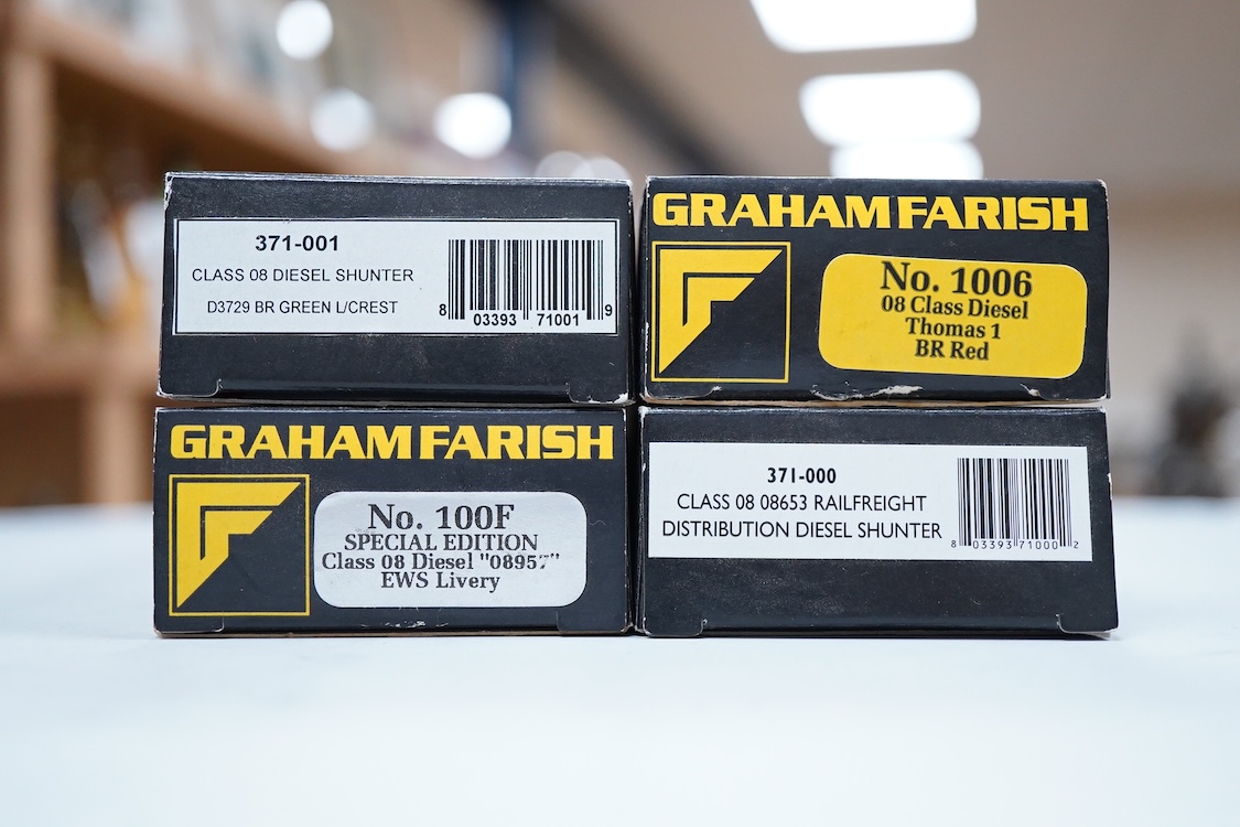 Four boxed Graham Farish N gauge railway Class 08 0-6-0 diesel locomotives; a BR, D3729 (371-001), a Railfreight Distribution, 08 653 (371-000), an EWS, 08957 (100F) and a Thomas 1, 08500 (1006).